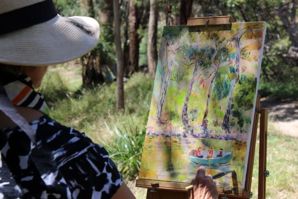 Justine Siedle working on the Yarra over looking Kew. 2021 - Copy